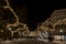 Street of Burgos decorated with Christmas lights and in the background the arch of Santa Maria