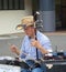 Street Busker Plays the Chinese Fiddle