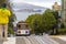 Street cable car in San Francisco going downhill to meeting Alcatraz Prison at the top of Hyde Street