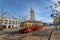 Street car or trollley or muni tram in front of San Francisco Ferry Building in Embarcadero - San Francisco, California, USA