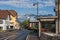 Street with cars and shops in the district of Le Fayet