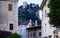 Street with Castello di Arco on rock at Garda lake