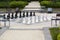 Street chessboard with black and white chessmen in the park