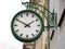 Street clock on wall of house, Jelenia Gora, Poland