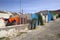 Street with colorful hanging football laundry and houses in Cape Verde