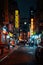 A street with colorful signs at night in Chinatown, Manhattan, New York City