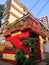 Street corner old fashioned house in the suburbs of Bandra Mumbai with green trees