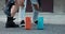 Street dance with music flowing from colorful two interconnected portable speakers