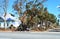 Street with debris piles awaiting pickup