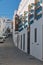 Street decorated with pots in Vejer de la Frontera, a beautiful