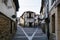 Street that divides in two in covarrubias with its typical white adobe and half-timbered houses of Burgos, Burgos