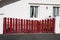 Street entry steel vintage suburb home red door dark metal retro house gate