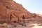 Street of Facades, which is caves with doors carved out of the red stone, Petra, Jordan