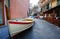 Street with fishing boats in a traditional Italian village Manarola