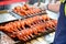 Street food, grilled chicken wings cooking on metal stove, most of popular snack at Pingxi, Taiwan