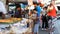 Street food market in Asia . Asian food. Abstract blur tourist buys Asian street food