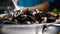 Street food mussels and shells. Cooking and mixing seafood in with spicy sauce large pan. Sale street food on local