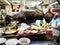 Street food in the night selling fresh groupers  fish and boiled rice