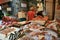 Street food in Palermo, Italy with tuna fish seller in a market 