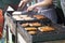 Street food, sausages and burgers being cooked at food festival