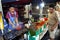 Street food vendor at her food stall sells grilled pork and chicken innards