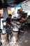 Street food vendor makes fried snacks in Kolkata