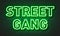 Street gang neon sign on brick wall background.