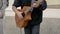 Street Guitarist Playing on the Street. Slow Motion
