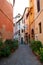 Street with hanging laundry in Rome in Italy