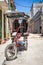 Street in Havana with an old three wheeled bicycle