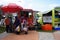 Street hawkers using food trucks to serve their business to the customer.