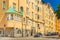 A street in Helsinki with the traditional Scandinavian architecture, bright yellow residential buildings, Finland