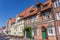 Street with historic houses and restaurant in Luneburg