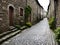 street in the historic town of cobble, cobbled road, Ai generated