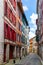 Street with historical houses in Bayonne city center