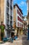 Street with historical houses in Bayonne city center.