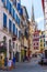 Street with historical houses in Bayonne city center. France