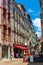 Street with historical houses in Bayonne city center. France