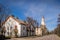 A street with houses and a church.