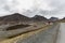 Street and houses of city of Longyearbyen, cloudy sky