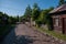 Street and houses in the Russian village Park outside the city of Heihe in the summer