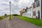 Street with houses by the sea in the medieval town of Saint Andrews in eastern Scotland.