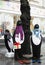 Street installation large toy penguins near tree
