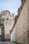 Street in the Italian Walled City of Soave with Crenellated Towers and Walls.