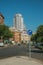 Street with KEEP RIGHT signpost and building in Madrid