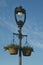Street Lamp and flower baskets.