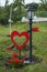 Street lamp. Installation on the theme of love, weddings in the park of lovers of hearts, Dobroslav, Ukraine