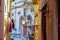 Street lamp and laundry in a picturesque narrow street of Alfama in the old town of Lisbon Portugal