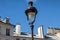 Street lamp over traditional Parisian architecture