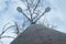 Street lamp photographed against the sky and clouds